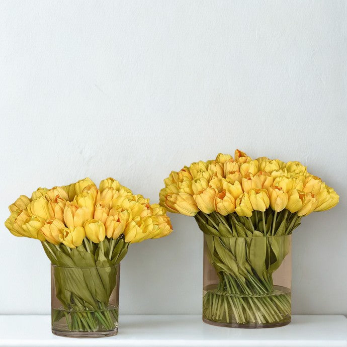 Large Tulip Arrangement in a round glass vase