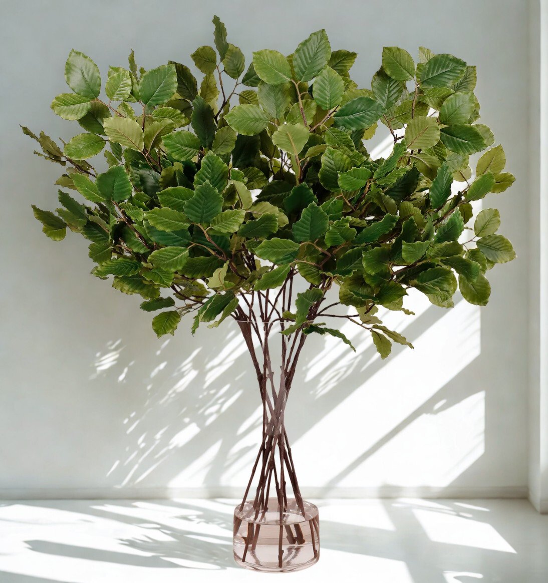 ARTIFICIAL BEECH SPRAY ARRANGEMENT IN GLASS VASE